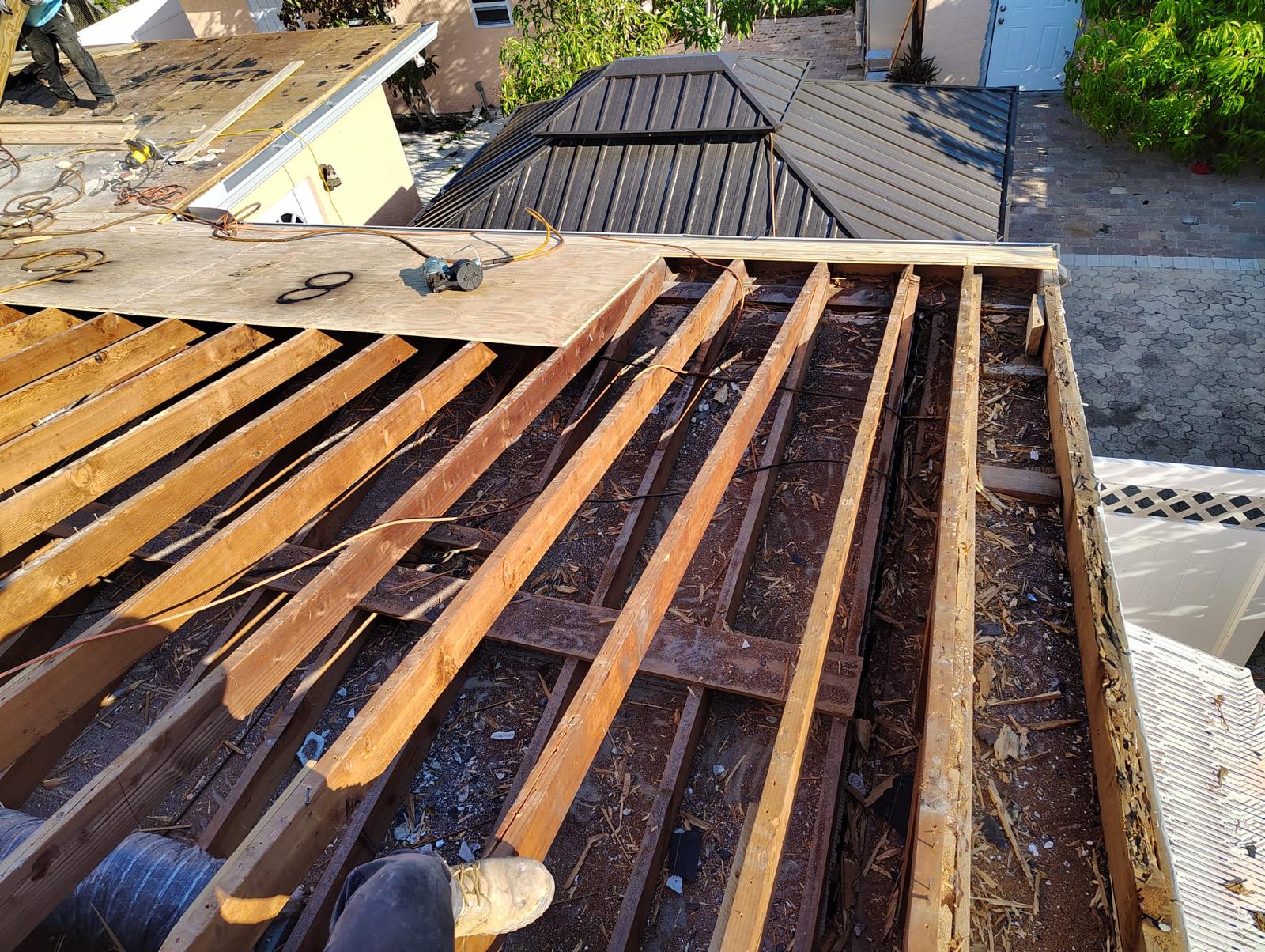 Commercial low-slope roof detail documented before repair in Miami