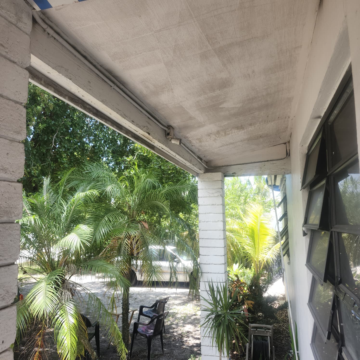 Roof edge, soffit, and drainage details checked before hurricane season in Miami