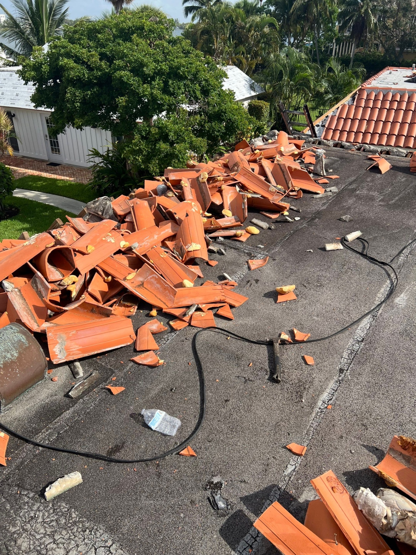Metal roof panels and fasteners inspected on a Miami home